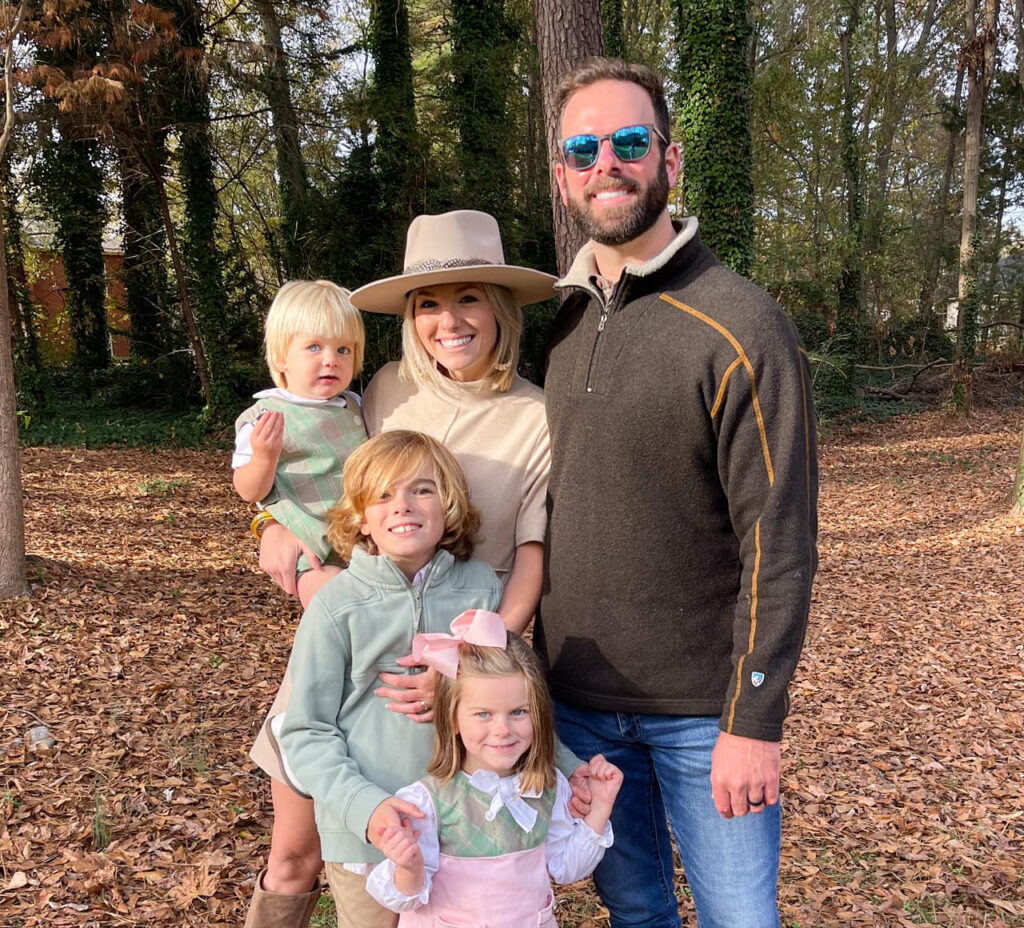 Family photo of owner, Douglas Mosteller, with his wife and three children.